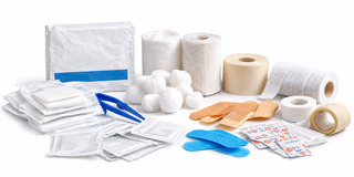 first aid dressing supplies on white